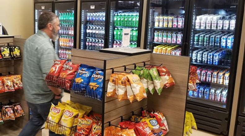A Winn Army Community Hospital employee visits the new AAFES micro market, Jan. 27 on Fort Stewart. The market offers an unmanned, automated convenience store option for Soldiers, civilian employees and hospital patrons at any time. Photo by Sylvia Carpenter