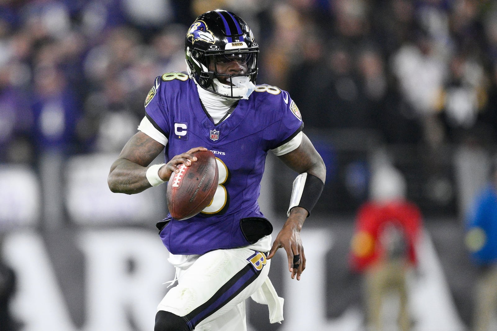 FILE - Baltimore Ravens quarterback Lamar Jackson (8) in action during the first half of an NFL football wild card playoff game against the Pittsburgh Steelers, Saturday, Jan. 11, 2025, in Baltimore. (AP Photo/Nick Wass, File)