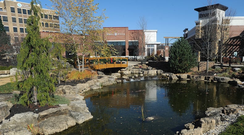 Miami Twp.'s first Designated Outdoor Refreshment Area, or DORA, will operate daily from 4 to 11 p.m. at the 96-acre Austin Landing complex. STAFF FILE PHOTO