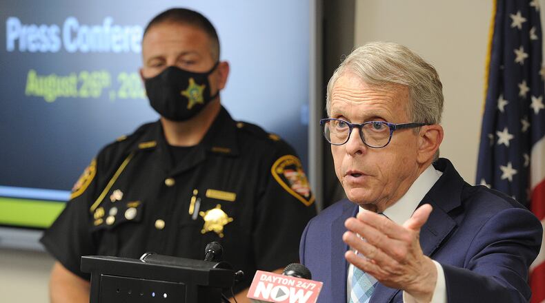 Governor Mike DeWine held a press conference with Sheriff Rob Streck Thursday morning, Aug. 26, 2021 to discus drug trends and investigations in Montgomery County. MARSHALL GORBY\STAFF
