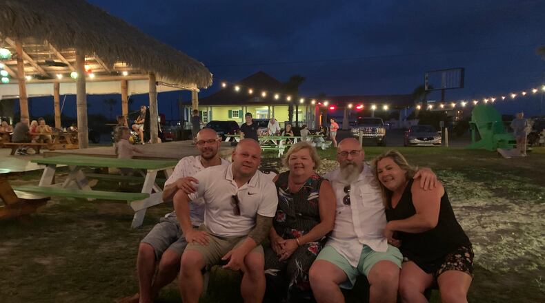 Riverside resident Terri Weglage, middle, and her husband, Mike, second from right, with their children.