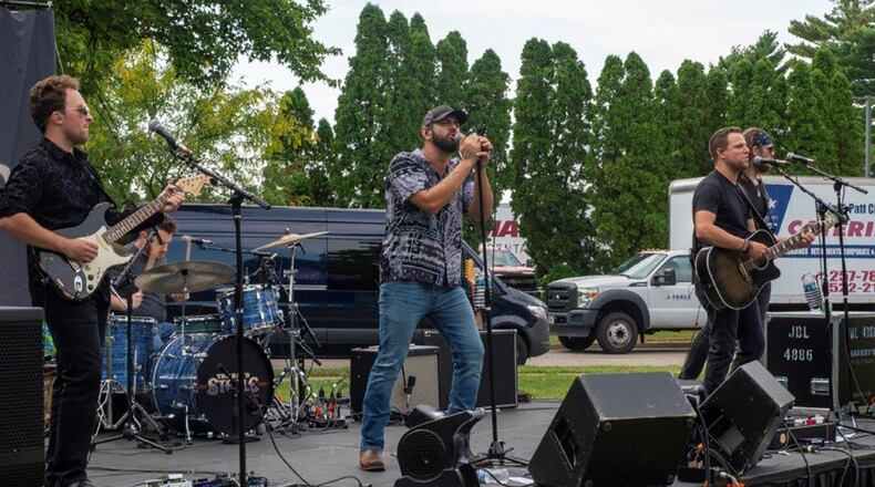 The Band Steele performs for a live audience of Wright-Patterson Air Force Base personnel and family members at the Aug. 25 summer Block Party, sponsored by the 88th Force Support Squadron. U.S. AIR FORCE PHOTO/AIRMAN 1ST CLASS JAMES JOHNSON