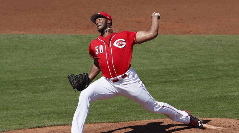 GOODYEAR, AZ - MARCH 08: Amir Garrett #50 of the Cincinnati Reds pitches in the first inning against the Los Angeles Angels during the spring training game at Goodyear Ballpark on March 8, 2017 in Goodyear, Arizona. (Photo by Tim Warner/Getty Images)