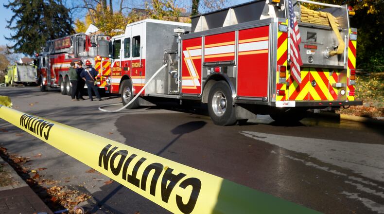 Dayton firefighters responded to a vacant house fire at Friday morning, Nov. 8, 2024 at in the 200 block of Victor Ave. MARSHALL GORBY\STAFF