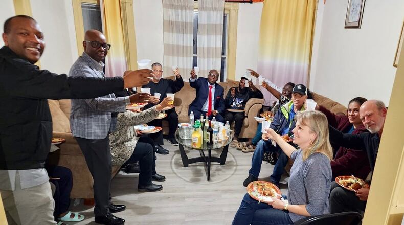 At the House of the People’s year-end board meeting , Board members provided dinner for current residents.