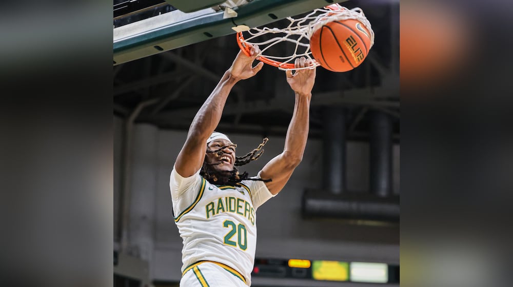 Wright State sophomore forward Andrea Holden, a Hamilton alum, dunks in the first half of a season opener against Franklin College on Monday, Nov. 3 at Ervin J. Nutter Center in Fairborn. BRYANT BILLING/STAFF