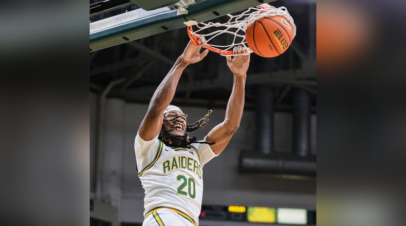 Wright State sophomore forward Andrea Holden, a Hamilton alum, dunks in the first half of a season opener against Franklin College on Monday, Nov. 3 at Ervin J. Nutter Center in Fairborn. BRYANT BILLING/STAFF