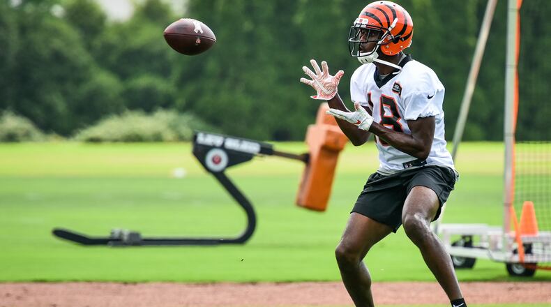 Bengals’ wide receiver A.J. Green catches a pass during organized team activities Tuesday, May 22, 2018, at the practice facility near Paul Brown Stadium in Cincinnati. NICK GRAHAM/STAFF