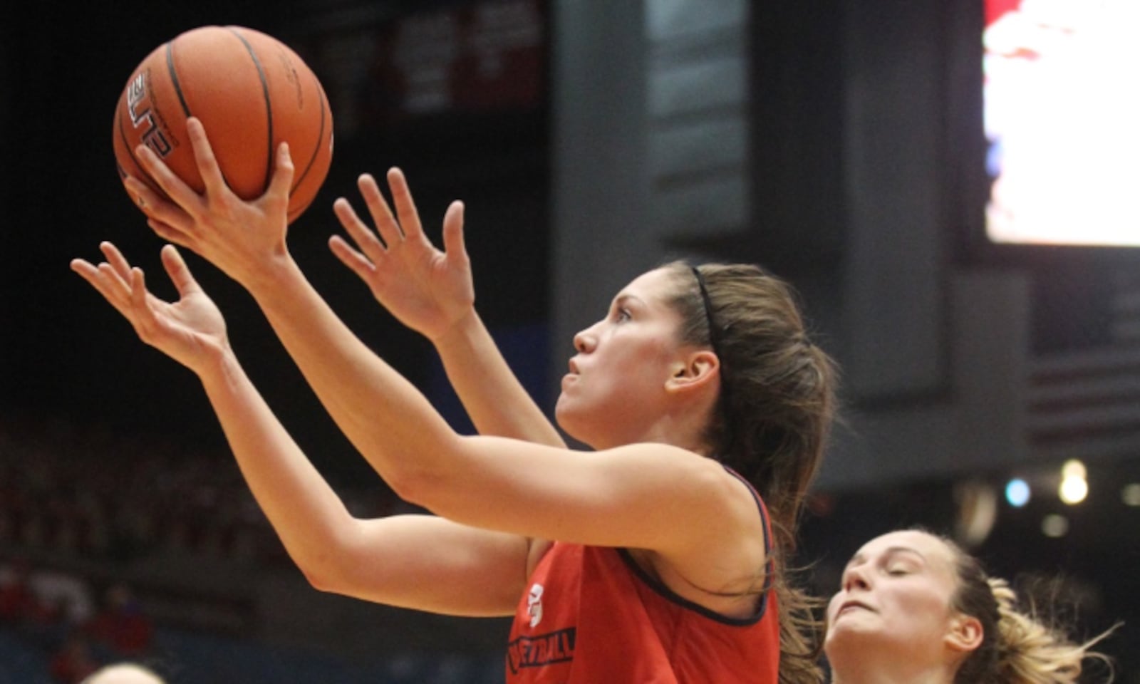 Dayton’s Kelley Austria shoots in the Red and Blue game on Oct. 24, at UD Arena. David Jablonski/Staff