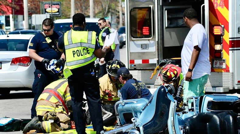 A motorcyclist who reportedly was not wearing a helmet was injured in a crash involving a car on North Fairfield Road in Beavercreek Monday, April 15, 2024. MARSHALL GORBY\STAFF