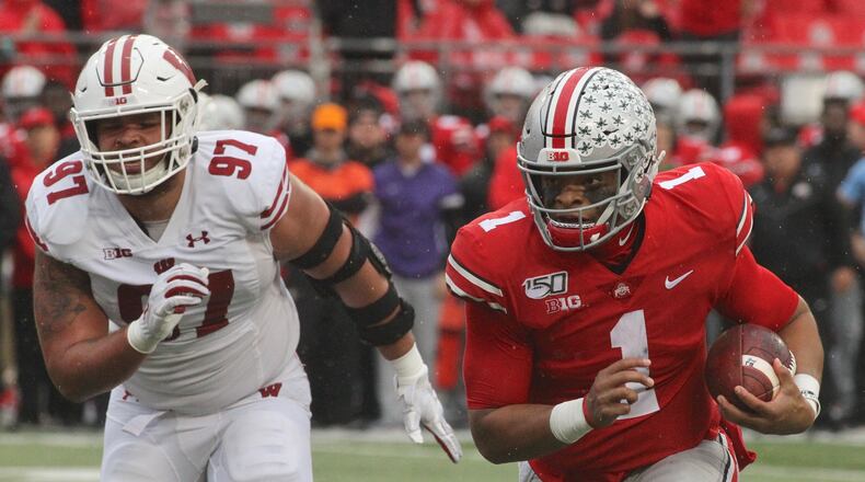 Ohio State’s Justin Fields runs for a touchdown in the third quarter against Wisconsin on Saturday, Oct. 26, 2019, at Ohio Stadium in Columbus. David Jablonski/Staff