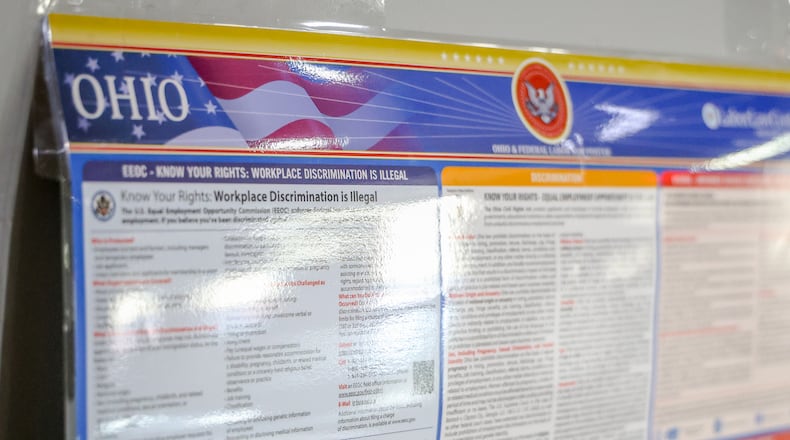 Senate Bill 33 was signed into law Monday and will preclude Ohio employers from posting certain labor notices in the workplace, including the state's laws on minimum wage, overtime and civil rights. BRYANT BILLING / STAFF