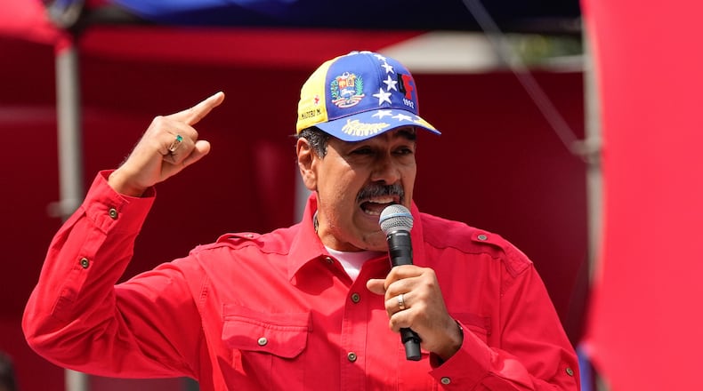 File - Venezuela's President Nicolas Maduro speaks to supporters during an event at the Miraflores Presidential palace in Caracas, Venezuela, Feb. 4, 2024. (AP Photo/Matias Delacroix,File)