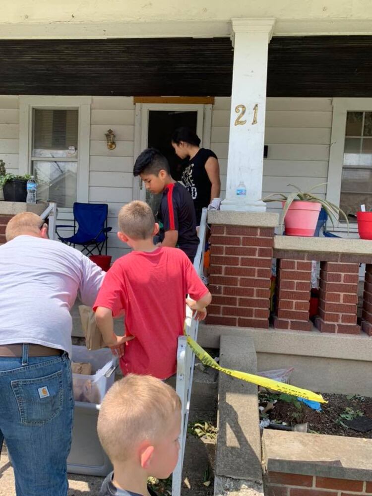 PHOTOS: People helping people after devastating tornadoes strike Miami Valley