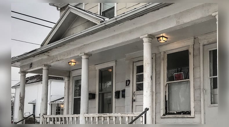 Dayton police detectives are investigating an apparent murder-suicide discovered Jan. 31, 2021, at a duplex at 17 N. Garfield St. The bodies of a man and woman were found inside the residence. JIM NOELKER/STAFF