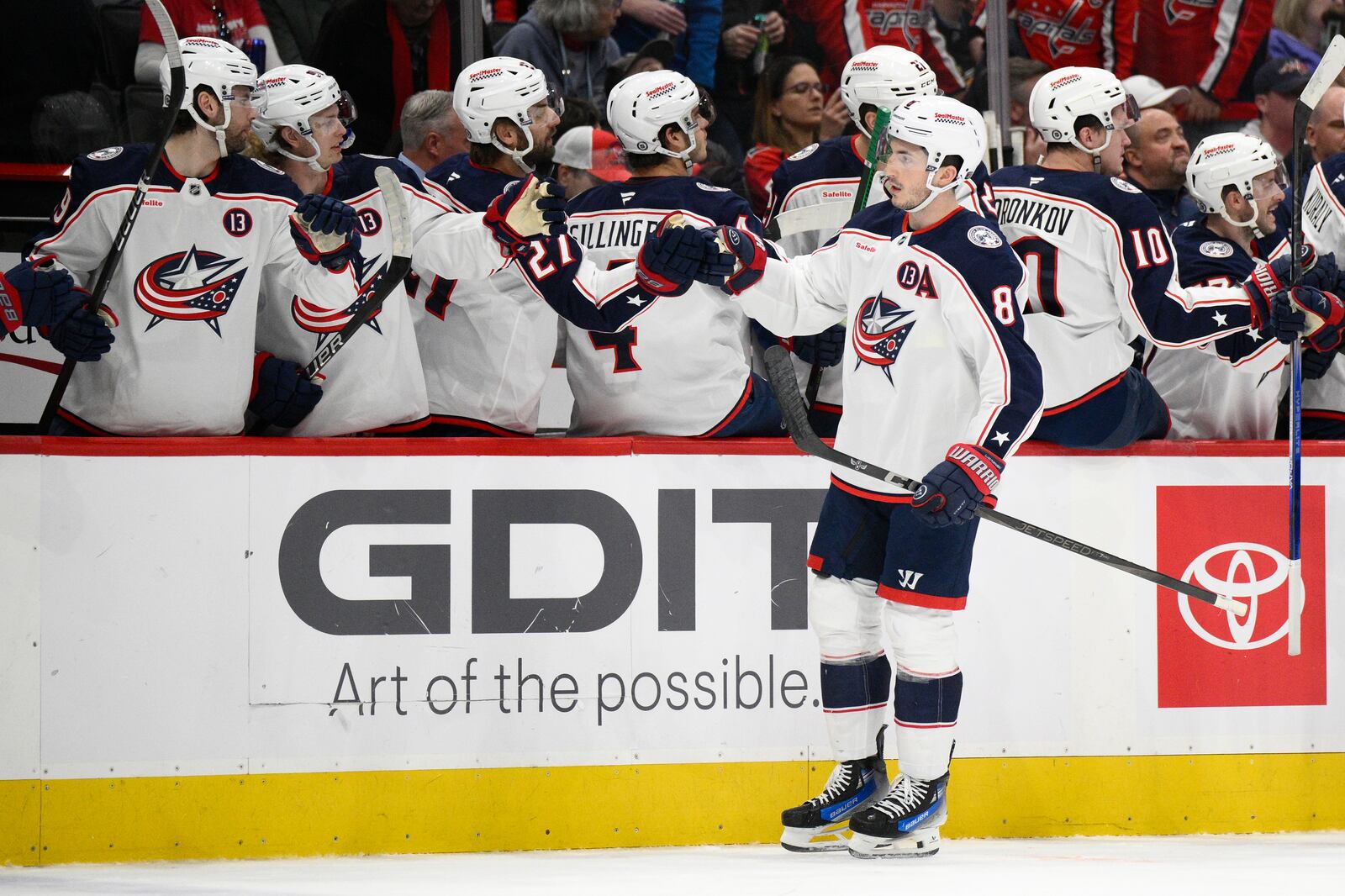 Columbus Blue Jackets defenseman Zach Werenski (8) celebrates his goal during the first period of an NHL hockey game against the Washington Capitals, Sunday, April 13, 2025, in Washington. (AP Photo/Nick Wass)