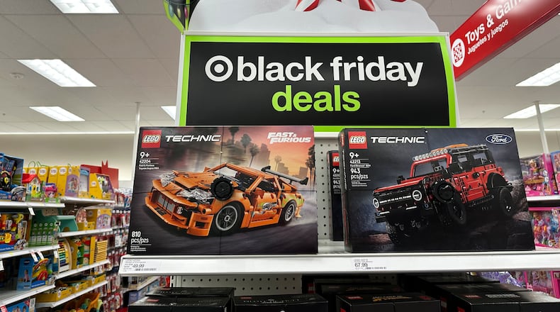 Sign marks special prices on toys as retailers roll out Black Friday deals, Wednesday, Nov. 26, 2025, in a Target store in southeast Denver. (AP Photo/David Zalubowski)