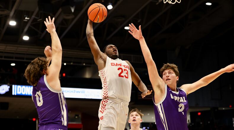 Dayton's R.J. Blakney dunks against Capital in the second half on Saturday, Oct. 29, 2022, at UD Arena. David Jablonski/Staff