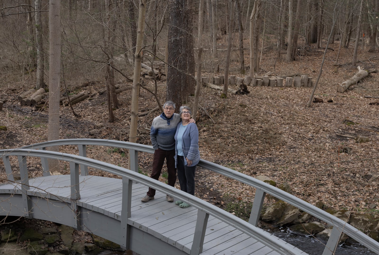 Jon Randall, left, and Mariane Randall, right, pose for a portrait at their home on Saturday, March 22, 2025, in Webster, N.Y. (Toni Duncan via AP)
