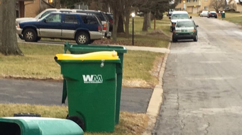 Miami Twp. officials said former trash vendor Waste Management Inc. left thousands of containers behind when its contract expired at the end of 2017, creating problems for residents. NICK BLIZZARD/STAFF