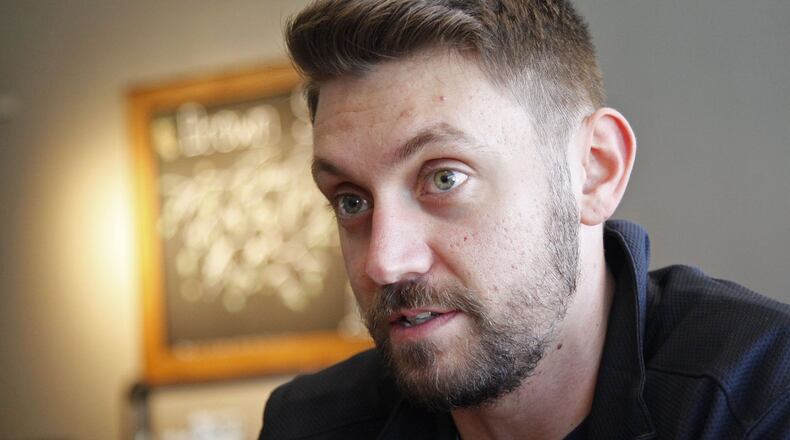 Army veteran Abe Hall served two tours in Afghanistan. The attacks on September 11th motivated Hall to join the Army after moving to the U.S. from Canada in 2008. TY GREENLEES / STAFF