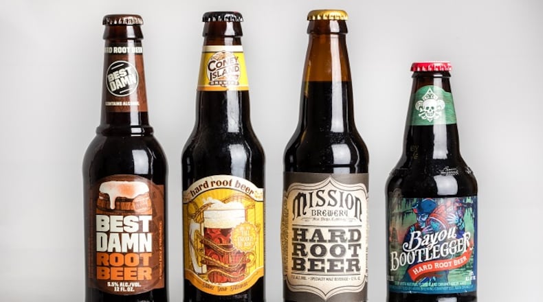 Five hard root beers were put to the test to see which was best. The tasters ended up picking the one that was least offensive (Coney Island second from left) and trying to kill the aftertaste. MUST CREDIT: Photo by Goran Kosanovic for The Washington Post