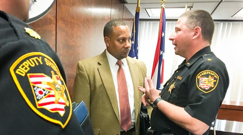 Montgomery County Administrator Michael Colbert and Montgomery County Sheriff Rob Streck speak after a July, 2020 meeting in which county commissioners approved moving forward with a jail expansion study phase. CHRIS STEWART / STAFF