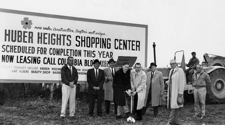 This is a picture from the late 50’s showing the groundbreaking for the Huber Center at the southwest corner of Chambersburg Road. and Brandt Pike. Charles Huber is in the light-colored overcoat on the right side of the shovel.