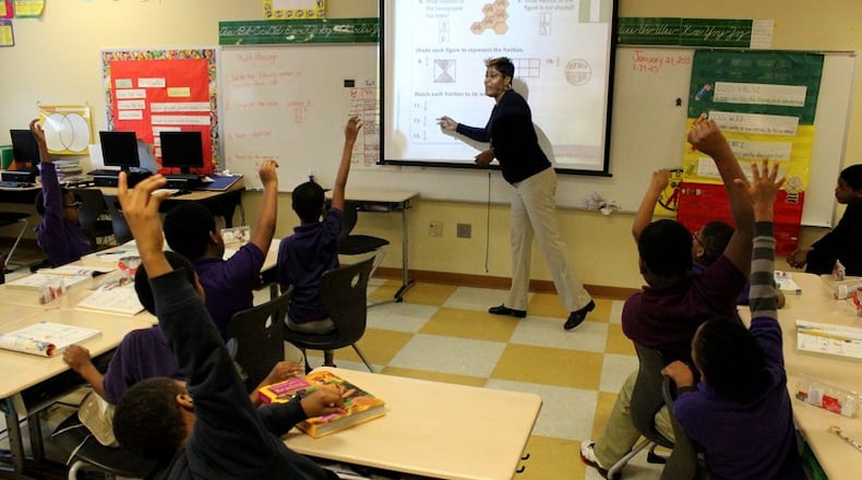 Dayton city government and the school district formed a task force to look at school buildings after Dayton Public Schools had earlier announced it might close some schools. CHUCK HAMLIN/STAFF