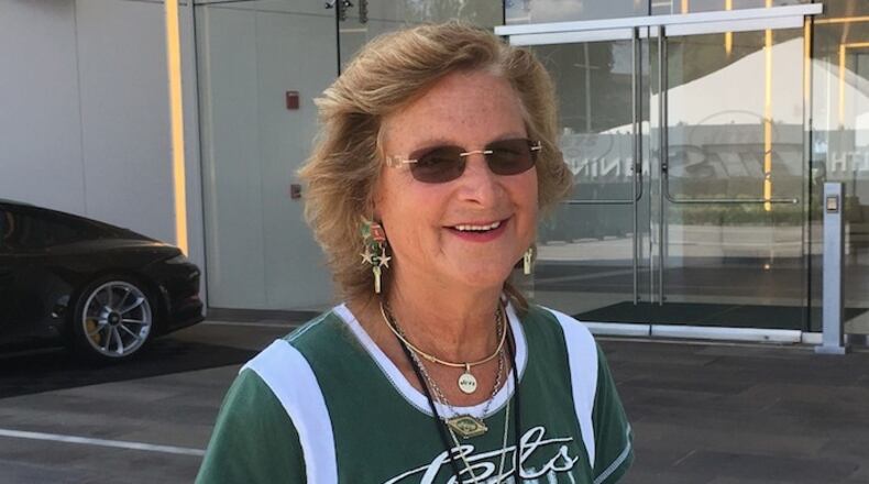 Former New York Jets scout Connie Carberg poses outside the Jets practice facility in Florham Park, N.J., Wednesday, Aug. 9, 2017. (AP Photo/Dennis Waszak Jr.)