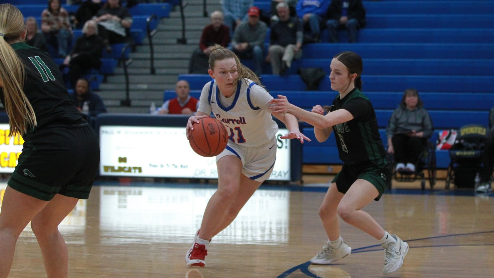 Carroll High School's Kiera Healy drives to the basket during their game against Greenville last season in Springfield. MARCUS HARTMAN / STAFF