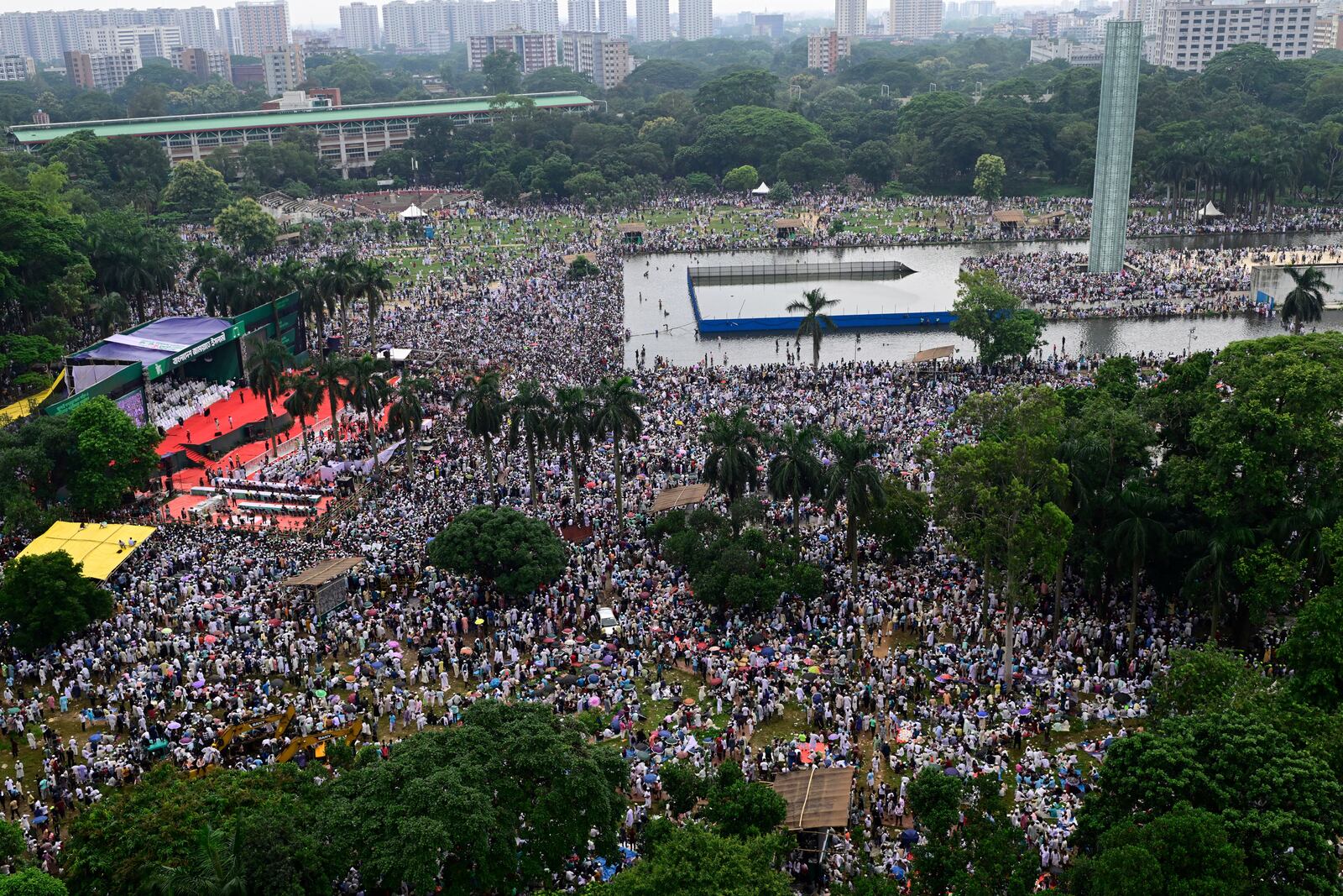 Thousands of supporters of Bangladesh's largest Islamist party Jamaat-e-Islami attend a rally in a show of strength ahead of elections expected next year, in Dhaka, Bangladesh, Saturday, July 19, 2025. (AP Photo/Mahmud Hossain Opu)