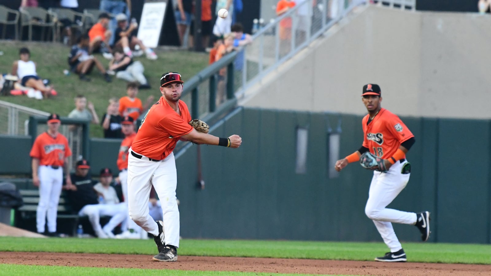 Dayton third baseman Carter Graham fires to first for an out Friday night at Day Air Ballpark. JEFF GILBERT/CONTRIBUTED