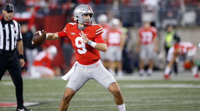 Ohio State quarterback Jack Miller drops back to pass against Akron during the second half of an NCAA college football game Saturday, Sept. 25, 2021, in Columbus, Ohio. (AP Photo/Jay LaPrete)