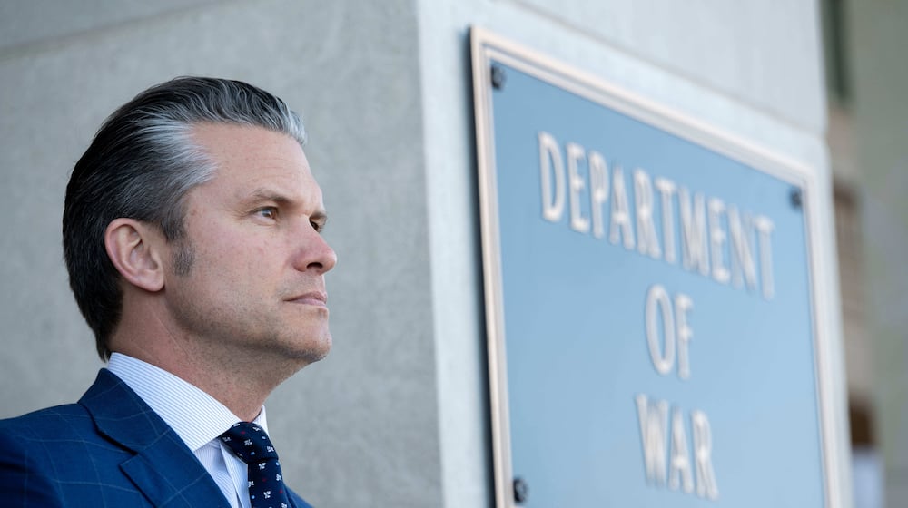 Defense Secretary Pete Hegseth stands outside the Pentagon during a welcome ceremony for Japanese Defense Minister Shinjirō Koizumi at the Pentagon, Thursday, Jan. 15, 2026 in Washington. (AP Photo/Kevin Wolf/)