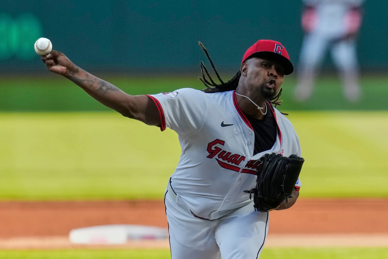 Cleveland Guardians' Luis Ortiz pitches in the first inning of a baseball game against the Philadelphia Phillies in Cleveland, Sunday, May 11, 2025. (AP Photo/Sue Ogrocki)