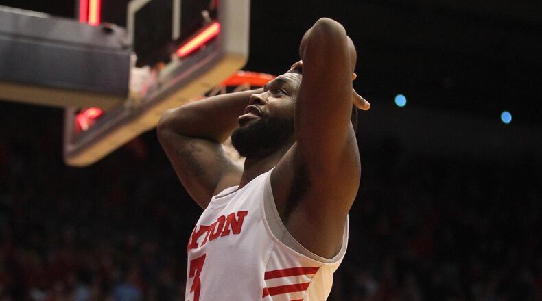 Dayton’s Trey Landers reacts after missing a shot in the final seconds of overtime against Rhode Island on Friday, March 1, 2019, at UD Arena. David Jablonski/Staff