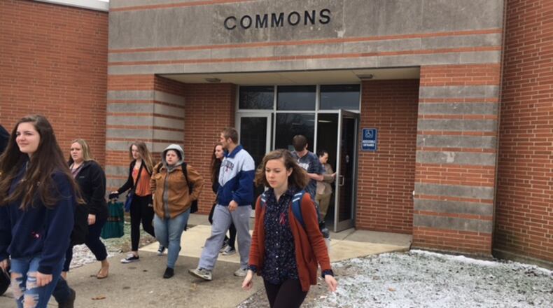 Students walk out of Kettering Fairmont High School in Kettering. NICK BLIZZARD / STAFF