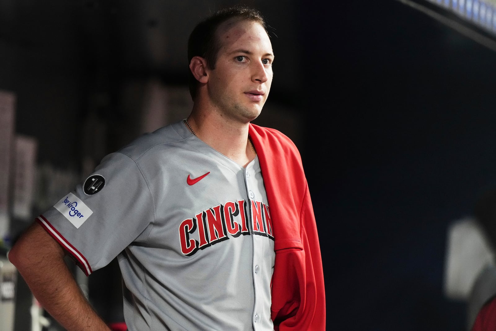 Cincinnati Reds starting pitcher Nick Lodolo looks from the dugout during the sixth inning of a baseball game against the Miami Marlins, Monday, April 21, 2025, in Miami. (AP Photo/Lynne Sladky)