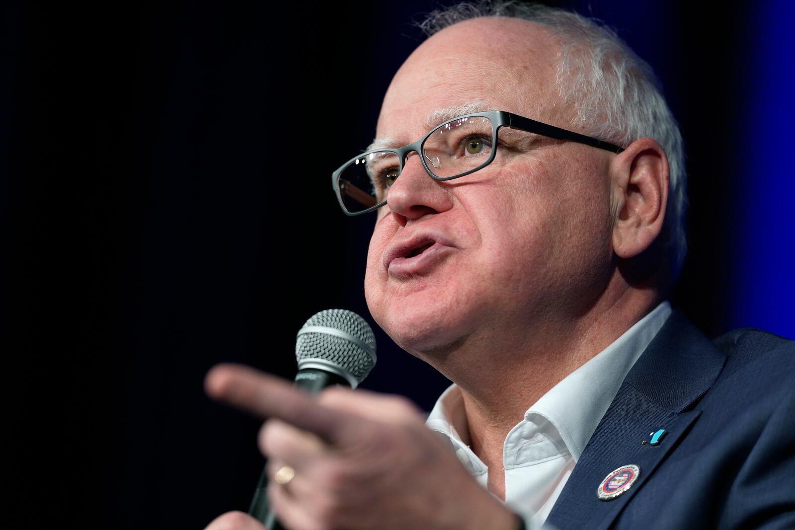 FILE - Minnesota Gov. Tim Walz speaks at a town hall event at Roosevelt High School, Friday, March 14, 2025, in Des Moines, Iowa. (AP Photo/Matthew Putney,File)