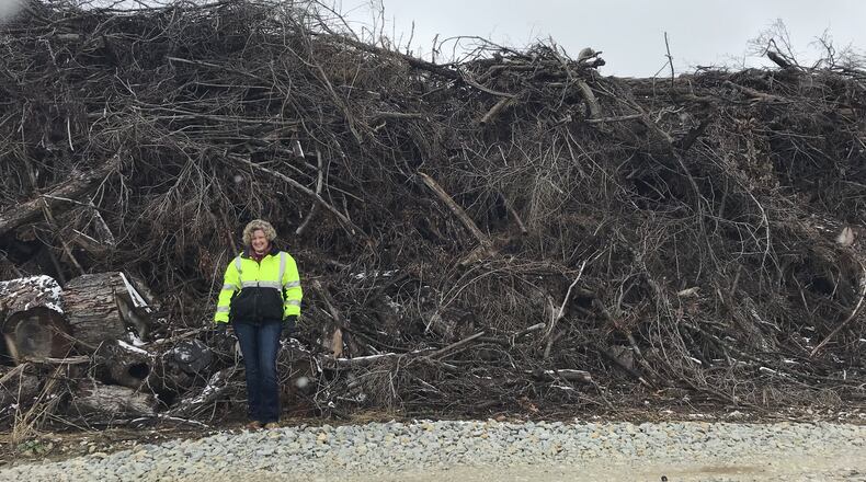 The pile of debris from the Memorial Day tornadoes at Greene County Environmental services sprawl across the width of the property, measuring approximately 74,000 cubic yards. Staff photo / Sarah Franks