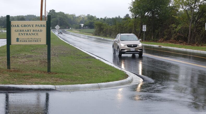 The Gebhart Road improvement project in southern Washington Twp. is now complete. The project included widening the two-lane road and installing curb, gutter and storm sewers from Social Row Road to the south end of Oak Grove Park. This view looks north along Gebhart from a park entrance. Construction began earlier in the summer, following spring utility work. TY GREENLEES / STAFF
