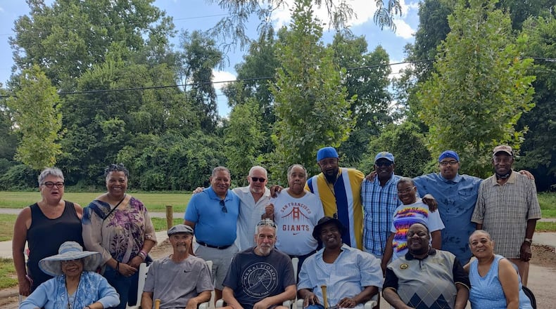 Nearly 50 years after they were pals growing up in their close-knit Lower Dayton View neighborhood, several of the old friends came from various parts of the country and gathered again on a recent Saturday at the old field – “Our Field of Dreams” Cliff Pierce called it – and shared memories, laughter and a few tears.
Front row, from left: Terri Ogletree, Kevin Daniel, Mark Dempsey, Alfred Pierce, Tony McCain, and Vicki McCain Moore.
Back row, from left: Martha Hardcastle, Carol Ogletree, Howard Jordan, David Chadwell, Ondray Coble, Cliff Piece. Andy Davenport, Denise Jones, David Davenport and Royal Starks .
 Jeanne Frazer-Coble/CONTRIBUTED.