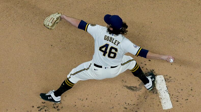 Milwaukee Brewers starter Zack Godley throws during the first inning of a baseball game against the Miami Marlins Wednesday, April 28, 2021, in Milwaukee. (AP Photo/Morry Gash)