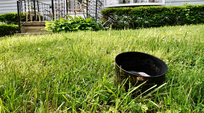 A 2-year-old and her parents were injured by burning grease the father was trying to throw outside on Thursday, May 23, 2019, in the 800 block of Millkin Road. NICK GRAHAM / STAFF