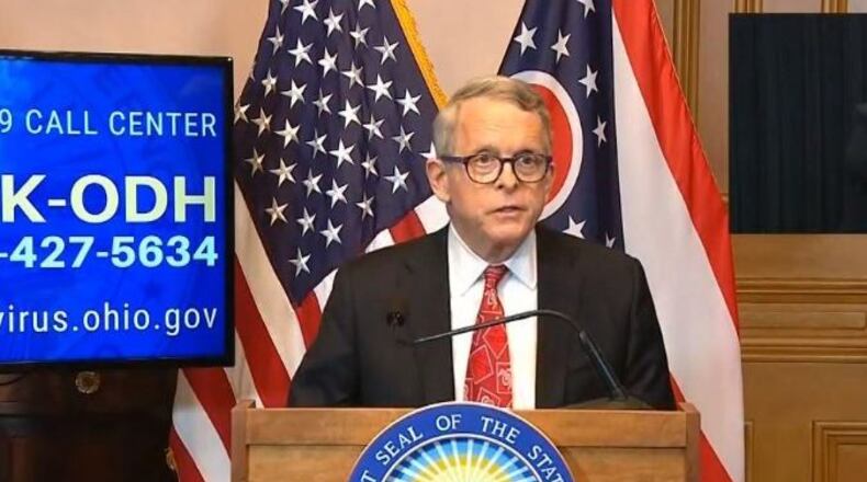 Gov. Mike DeWine announced $775 million in state budget cuts Tuesday.