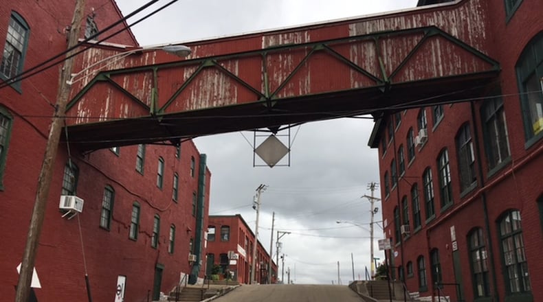 A connecting structure between two of the buildings in the Front Street complex, above East Second Street. The Dayton-Montgomery County Port Authority approved PACE program financing for this site in 2017. THOMAS GNAU/STAFF