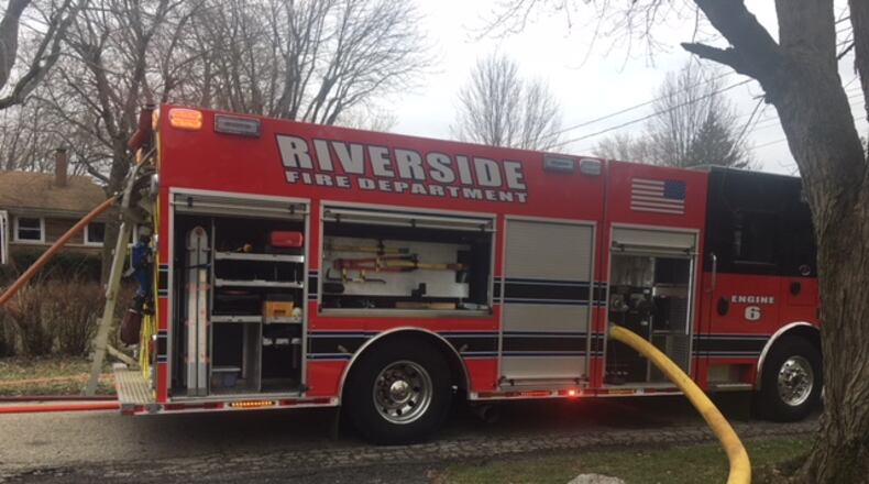 A man and woman are jailed tonight on suspicion of arson stemming from a Riverside house fire. Photos by Emily Kronenberger