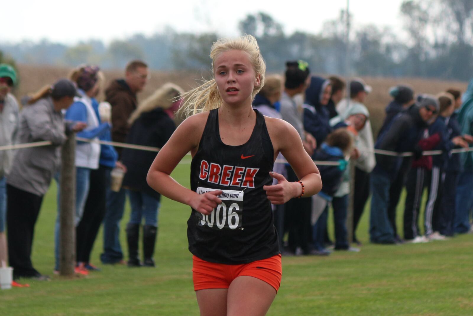 Beavercreek junior Savannah Roark finished second at the Division I girls cross country district championship to help Beavercreek claim the team title at Cedarville University on Saturday. Contributed / Greg Billing