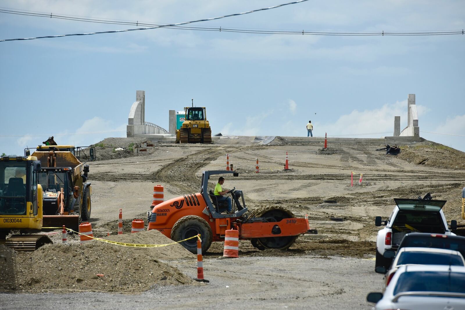 The long-awaited South Hamilton Crossing, sought for more than a century, still has a lot of work to go before it opens later this fall. 